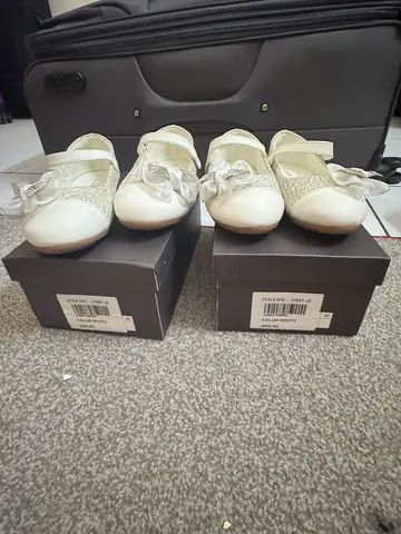 Pair of white baby girl dress shoes, unused in box (size small)