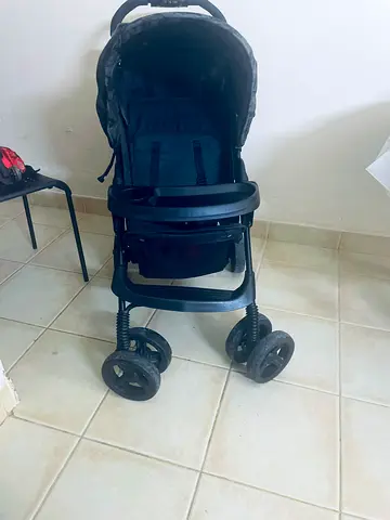 Used black baby stroller in good condition
