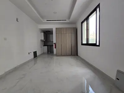First resident _ wall cabinets _ semi-detached kitchen _ central air conditioning _ quiet area _ easy exit to Dubai and Sharjah