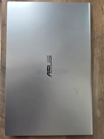 ASUS Silver Laptop - Good Condition, Normal Use