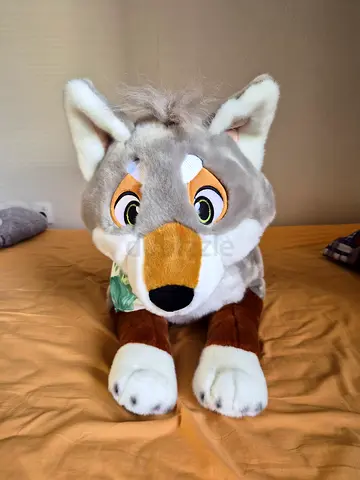 Dusty coyote plush