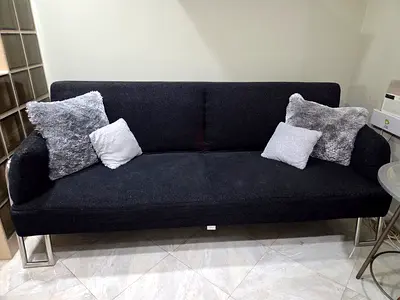 Modern black 3-seater sofa bed in good condition
