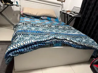 Single white storage bed with mattress and bedding - good condition