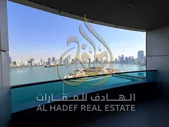 A royal apartment with a full panoramic view of Khalid Lagoon and Sharjah Sea, with free gym, free p