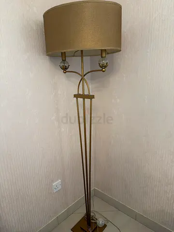 Tall brass floor lamp with fabric shade