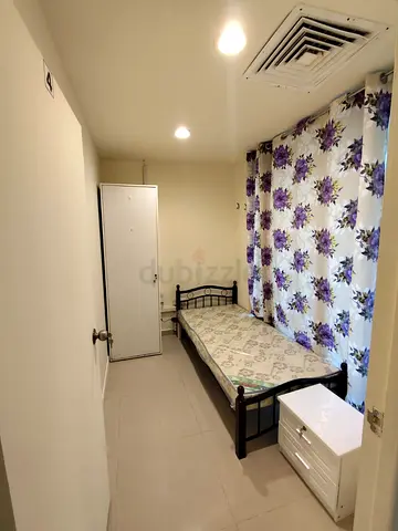 Small room available for executive lady behind mall of emirates