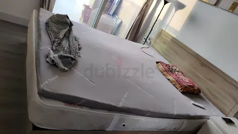 King size bed (without storage) with mattress and cushiontop (used) - good condition