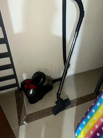 Used Canister Vacuum Cleaner - Compact and Functional
