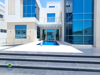 Prime location in Al Yasmin, luxury villa with 6 bedrooms, roof terrace, and swimming pool, including electricity, water, and air conditioning.
