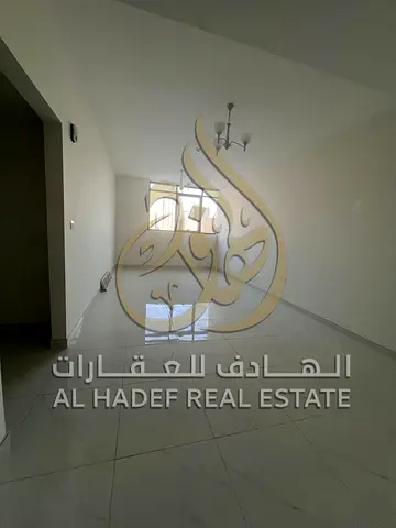 شقة غرفتين وصالة أول ساكن للإيجار في التعاون الشارقة على مخرج دبي باركن مجاني وموقع مميز مع تسهيلات دفع