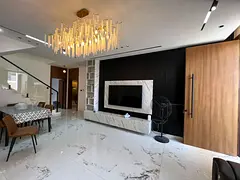 Furnished villa for rent in Al Bahia, Ajman. 5 master bedrooms, a majlis, and 2 living rooms, fully