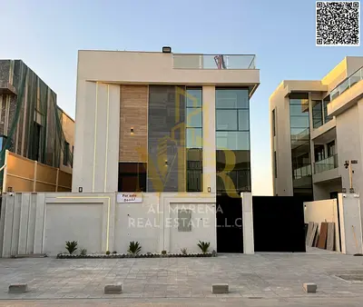 Luxury villa with pool and roof in Al Yasmin, featuring a modern design and ideal spaces.