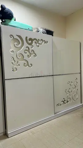 White Sliding Wardrobe with Decorative Cutouts - 2 Doors, Good Condition