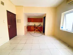 Lavish Studio Flat | With Split AC | Nearby Al Medina shopping center roadside building |