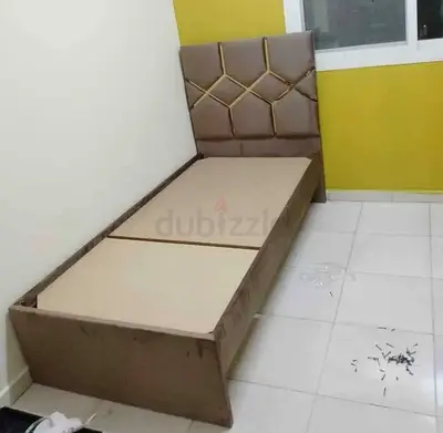 Single bed frame with upholstered headboard — good condition