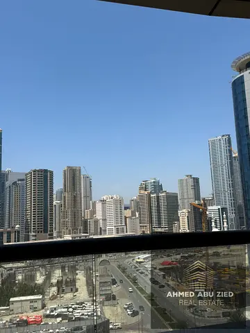 Two bedrooms and a living room in Sharjah, Al Khan, near Al Mamzar Lake, with free parking, 3 bathr