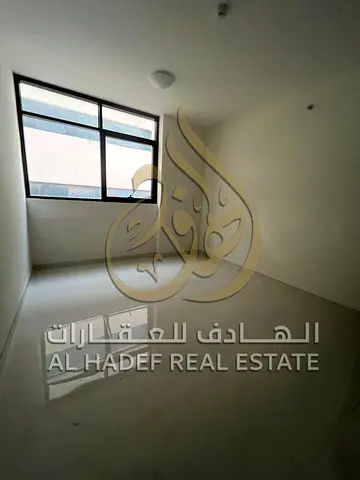 شقة غرفة وصالة أول ساكن للإيجار في التعاون الشارقة على مخرج دبي باركن مجاني وموقع مميز مع تسهيلات دفع