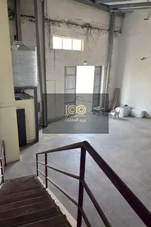 8000 sqft warehouse UAQ mezzanine 100KW AED 310K two main roads offices ready