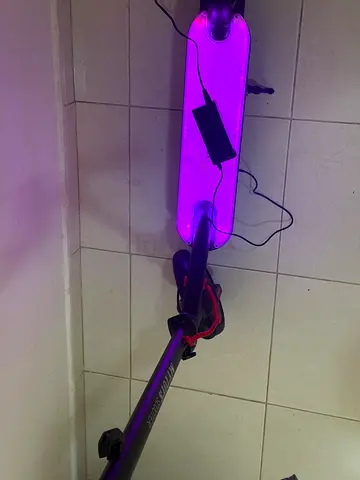 Used electric scooter with LED deck - good condition