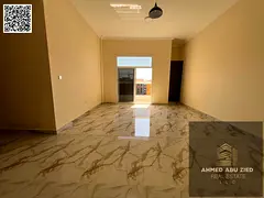 Two-bedroom apartment with a living room for annual rent in Al Muwaihat 3, on Academy Street, in a b