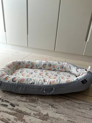 Baby lounger / nest - gently used, neutral rainbow design