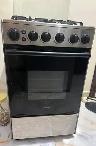 Midea 4 Burner Gas Cooker 50 X 55 with free cylinder trolley