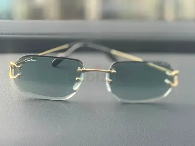 Cartier rimless designer sunglasses - gold accents CT 0468S