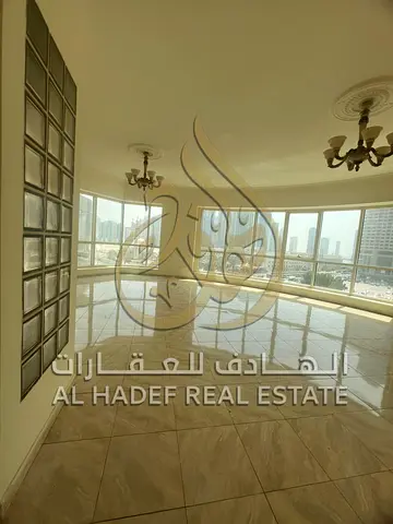 For rent in Sharjah ✅In Al Majaz 3  ✅3 bedrooms and a hall, annual rent 3 bathrooms with a kitchen, great view  ✅Free gym - Free month - ✅Free swimmin