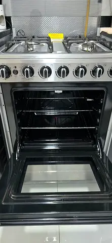 Midea Gas Range with 4 burners plus free refrigerator. RFS: moving out.