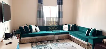 1BR apartment for rent in Ajman Khalifa St near Gulf Bridge, enclosed hall, central AC, 2 baths, par