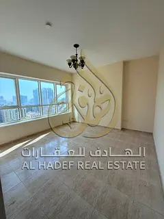 For Rent in Sharjah, Al Taawun Area 3-bedroom apartment with a living room, storage room, hallway, a
