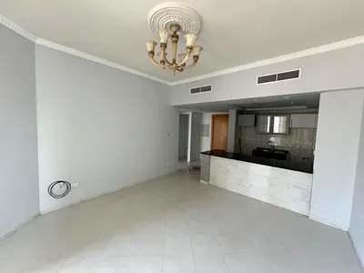 One-bedroom apartment with American kitchen, free AC, gym, and pool in Al Majaz 3