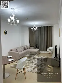 Furnished one-bedroom apartment for monthly rent in Al Yasmin Towers, opposite City Centre Ajman, in