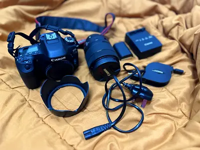 Canon DSLR Kit with 18-135mm Lens, Extra Battery  Accessories