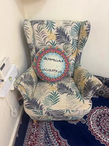 Comfortable patterned armchair with cushion - gently used