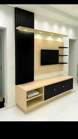 Modern wall-mounted entertainment center with shelves and LED lighting