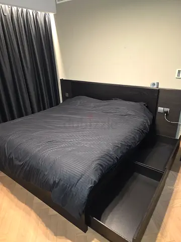 Black king size bed with mattress