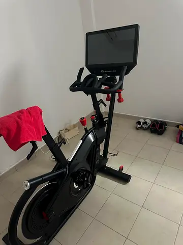 Indoor exercise bike with touchscreen display (Bowflex) interactive classes — like new condition.