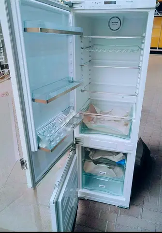 Miele brand like new built in bottom freezer perfect working delivery with warranty