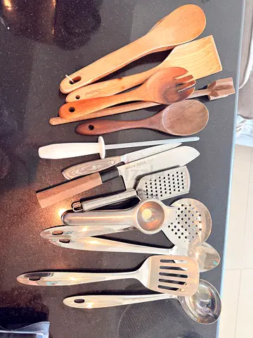 Mixed wooden and stainless steel kitchen utensil set - spoons, spatulas, ladles, knives