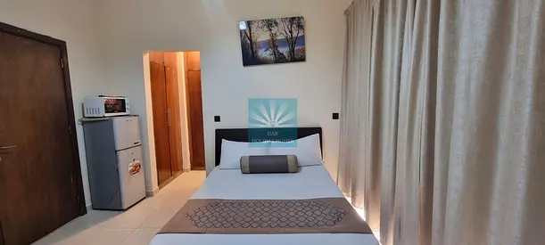 Fully Furnished Master Bedroom in JVC | Spacious | Private Terrace | Walk‑in Closet | with Parking