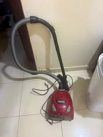 Red canister vacuum cleaner - good working condition