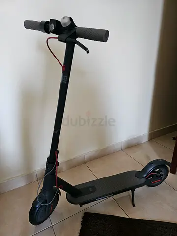 Unused electric scooter in good working condition - sturdy deck and lights