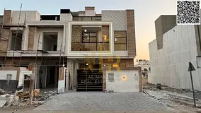 Modern villa in Al Yasmin, two floors and a roof, 5 master bedrooms, with a spacious building area a