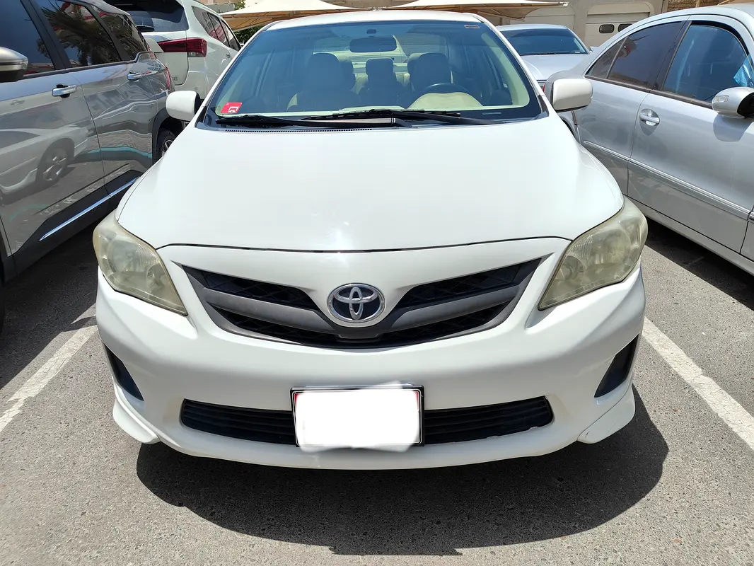 Toyota Corolla 2013 — photo 1 of 6