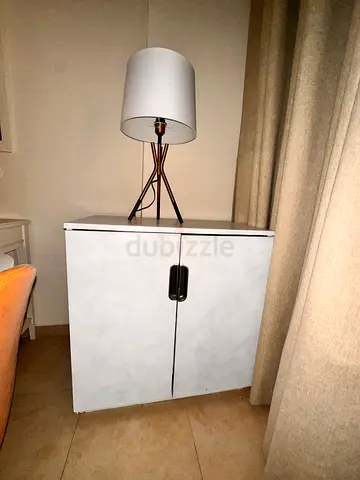 Small two-door bedside cabinet / storage cupboard - white top, grey interior