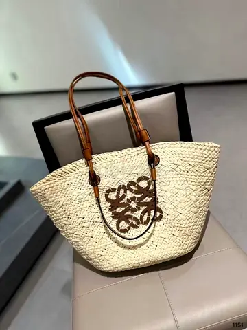Woven Straw Tote Bag with Leather Handles and Decorative Logo