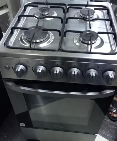 4-Burner Stainless Steel Gas Cooker with Oven - Good Condition