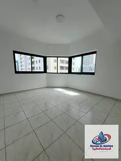 Apartment for annual rent in Sharjah, Al Majaz 2 area. Two spacious bedrooms, a large living room wi