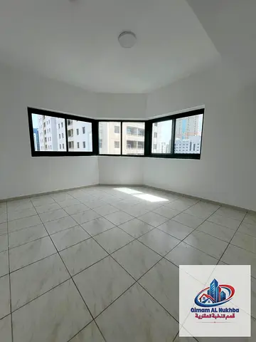 Apartment for annual rent in Sharjah, Al Majaz 2 area. Two spacious bedrooms, a large living room with an open view, natural ventilation and comfortab